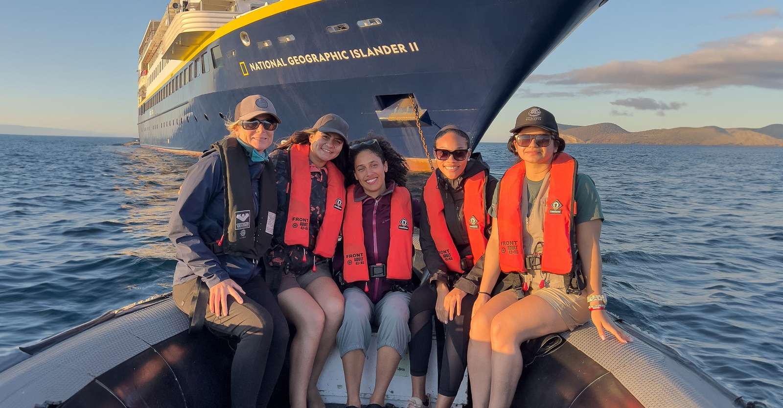 Guests aboard Zodiac and National Geographic Islander II, Galapagos Islands, Ecuador.